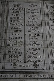 Photograph shows two columns of French names etched in stone.