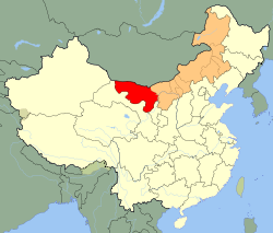 Map of China with Inner Mongolia highlighted in orange and Alxa League, where the desert is located, highlighted in red.