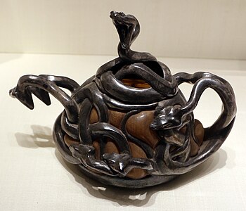 Sepia-colored glass sugar bowl with snakes of silver by Lalique (1902) (Calouste Gulbenkian Museum, Lisbon)