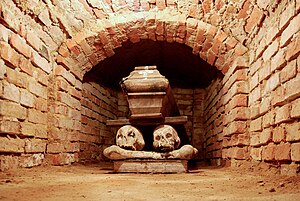 Coffin in a brick-lined crypt beneath a church in Wola Gułowska