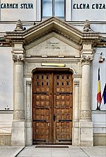 Romanian Revival door pediment of the Școala Centrală National College, Bucharest, Romania, by Ion Minuc, 1890