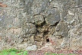 Southern curtain wall with a mark of artillery bullet impact