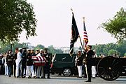 The casket of former President Ronald Reagan is transferred from a hearse to a caisson at 16th Street and Constitution Avenue in Washington, D.C. on June 9, 2004.