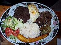 A casado is a Costa Rican meal consisting of a tortilla, rice, black beans, plantains, salad, and an optional protein source like beef, pork, chicken, fish, etc.