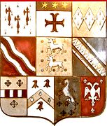 Heraldic quarterings of Sir Robert Dennis on stone escutcheon at Livery Dole