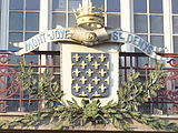 Arms on the front of the post office, rue de la République