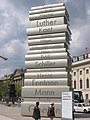 Image 2812-metre-high (40 ft) stack of books sculpture at the Berlin Walk of Ideas, commemorating the invention of modern book printing (from History of books)