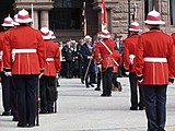 The Royal Canadian Regiment's full dress tunic is scarlet with white pipings on its back.