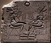 Royal family: Akhenaten, Nefertiti and the three daughters; c. 1352–1336 BC; limestone; height: 50 cm; Egyptian Museum of Berlin (Germany)[187]