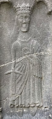 A carving of Saint Catherine of Alexandria from the O'Crean Tomb in Sligo Abbey dating from 1506.