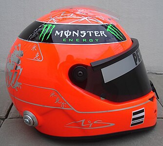 Schuberth helmet for the 2011 season (Mercedes GP); Schumacher kept using a red-coloured helmet at Silver Arrows. Chinese dragon illustration and a Chinese character (力, which stands for "power") are inscribed on the back of the helmet.