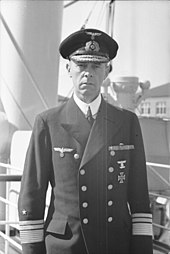 Black and white photograph of a middle aged man wearing military uniform