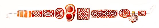 Etched carnelian beads excavated in tomb PG 1133 of the Royal Cemetery of Ur, 2600-2500 BCE.[19]