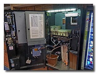 Mechanisms inside of a coffee vending machine