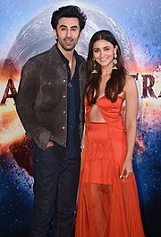 Alia Bhatt and Ranbir Kapoor pose for and smile for the camera