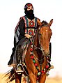 Image 13A Saudi woman riding a horse at Souk Okaz, a yearly cultural festival in the outskirts of Taif (from Culture of Saudi Arabia)