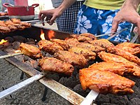Chicken wings being barbecued