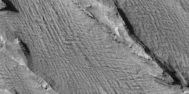 Yardangs, as seen by HiRISE under HiWish program. Location is near Gordii Dorsum in the Amazonis quadrangle. Note: this is an enlargement of previous image.