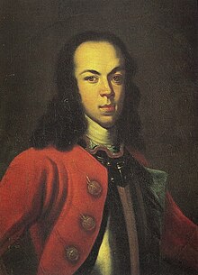 Painting of a young or middle-aged man, balding, shoulder-length black hair. He wears a red military coat over armour.