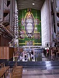 Graham Sutherland's Christ tapestry in the rebuilt Coventry Cathedral; 1962.[159]