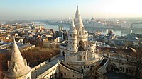 Fisherman's Bastion at the Castle Hill of old Budapest (Buda). Part of the fortification, city centre in the background