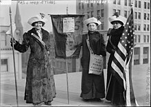 Rosalie Jones, with fellow suffragettes Jessie Stubbs and Ida Craft, handing out WSP meeting fliers, circa 1912-1913