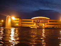 Building across water at night