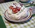 Image 51Pavlova, a popular New Zealand dessert, garnished with cream and strawberries. (from Culture of New Zealand)