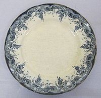 "Laburnham" pattern transfer-printed plate. Typical of the middle market bone china tableware made at Burslem.