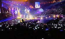 2NE1 onstage, seen from a distance
