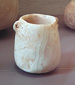 Alabaster pot with handles, Buqras region, 6500 BCE Louvre Museum AO 28519