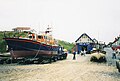 The Cromer Mersey-class Lifeboat "Her Majesty the Queen" (ON1189, temporarily on station during boathouse rebuilding) on the beach at Cromer near the old lifeboat station