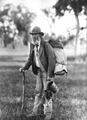 Image 52A swagman in bushman's apparel, wearing a brimmed hat and carrying swag, and billy can. (from Culture of Australia)