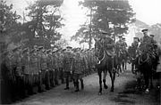 King George V inspecting the British 29th Division prior to the division's departure for Gallipoli in 1915. The division commander, Major General Aylmer Hunter-Weston, rides alongside the King at the right of the photo.