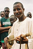Niger and northern Nigeria. Hausa musician playing a gurmi