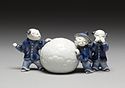 Mikawachi ware brush rest in the form of boys with a snowball, porcelain with underglaze blue, Edo period, 1800-1830