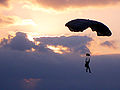 A Marine Raider glides towards his target during high-altitude parachute operations.