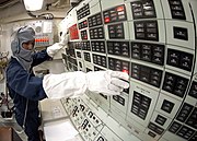 YN2 Nelson Munoz mans Damage Control Console during "general quarters" drill aboard USS Shiloh (CG-67).