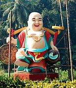 Statue of Budai in the Chinese style at Chalakudy, Kerala, India.