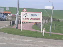 "Welcome to Beach Camperduin" sign