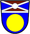 a fillet saltire (or a saltire fillet)—Azure, a bezant; a chief per saltire, murrey and azure, filleted argent, over the partition a fillet saltire nowy, also argent—de Jong, RSA