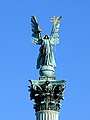 The top of the column depicts Archangel Gabriel, who holds the Hungarian Holy Crown and the apostolic double cross in his hands
