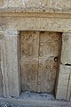 Stone door at entrance to Catacomb no. 20 imitating embossed wooden door