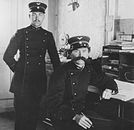 Two officers of the JS in the office of Kaiserstuhl station.