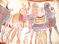 Mural of riderless saddled horses in detail