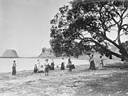Looking east along Biddicks Bay towards Takaparawha showing Bastion Rock, since demolished, 1901.