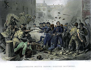 A lithograph depicting a group of militia soldiers surrounded by a large crowd of rioters with firearms and clubs. Projectiles, stones and bricks, fill the air above the soldiers.