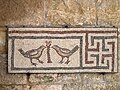 Fifth-century mosaic of two doves and a swastika at Beiteddine Palace.