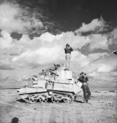 The crew of a Light Tank Mk VIB reconnoitring near Tobruk, 28 November 1941