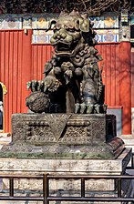 A Chinese guardian lion outside the temple